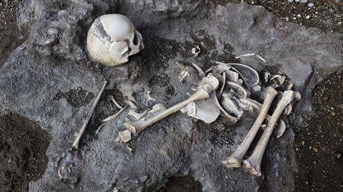 Tragic remains of Pompeii child who tried to shelter from volcano found at 'grand baths'