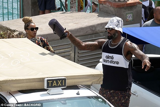 LeBron James made sure he brought a speaker on his boat  trip with his wife, Savannah, Wed.